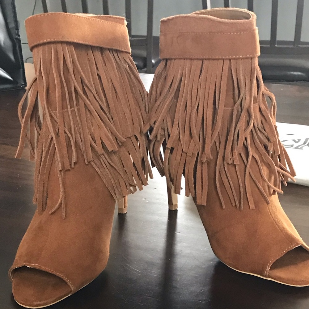 Fringed, open toe boots